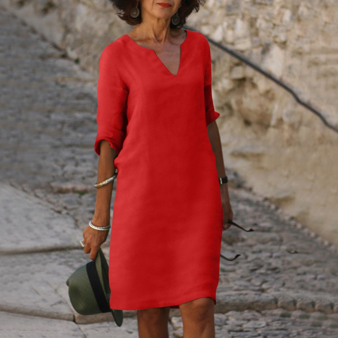 Flowy V-neck midi dress for women, relaxed fit, ideal for summer casual outings.
