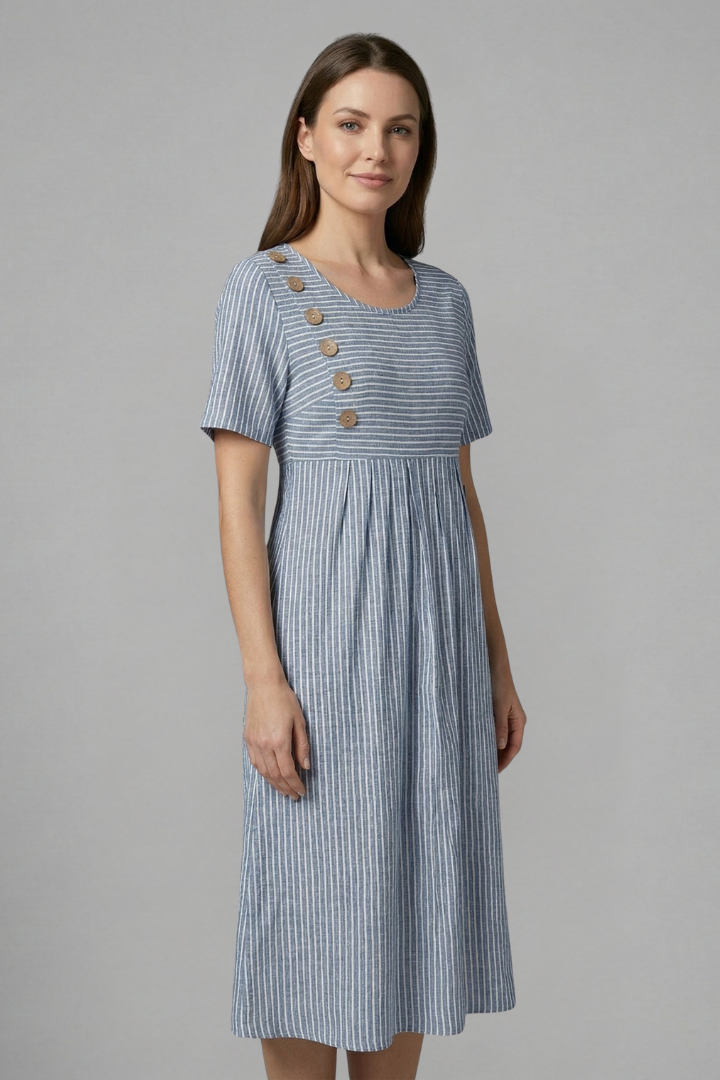Fashionable women's midi dress with V-neck and delicate button detail. A perfect blend of comfort and style.