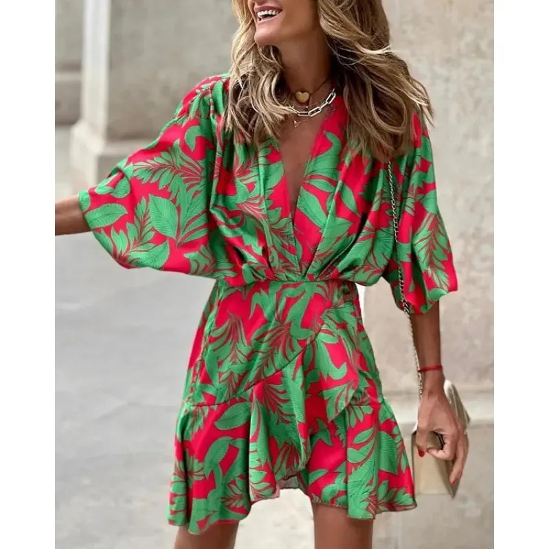 Stylish women's short swing dress, featuring a colorful abstract print and elegant V-neck ruffles.
