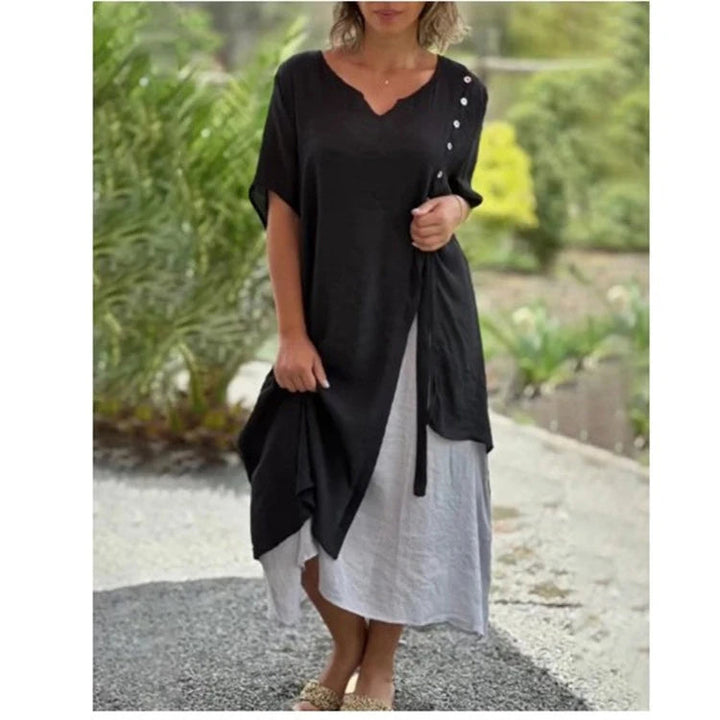 Elegant blue women's layered midi dress with V-neck & short sleeves, a comfortable summer essential.