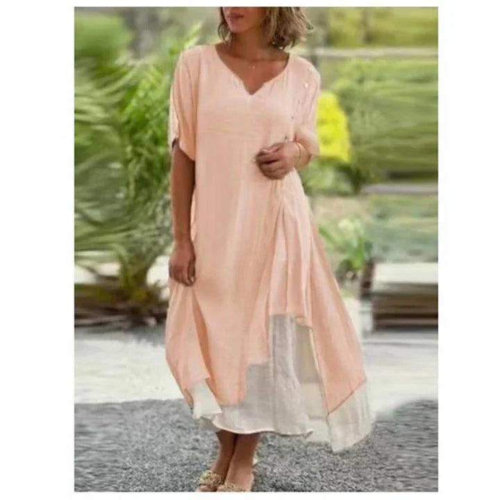 Casual black layered midi dress, short sleeve V-neck, flowy design for women, perfect for warm weather.