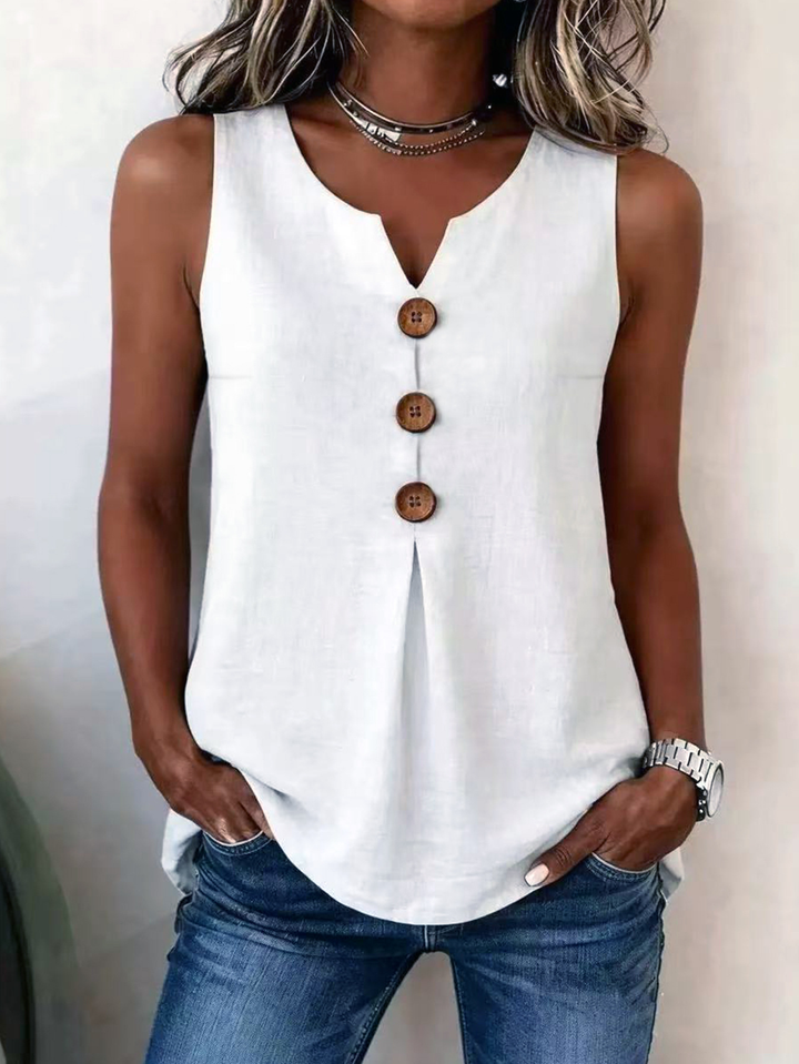 White V-neck sleeveless blouse for women with elegant pleated front. A comfortable everyday summer top.