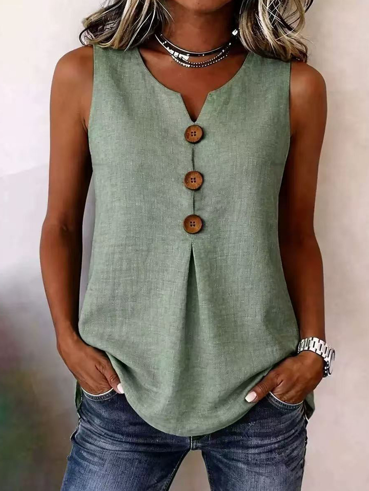 Stylish women's sleeveless blouse featuring a V-neck and delicate pleated front. Perfect for summer.