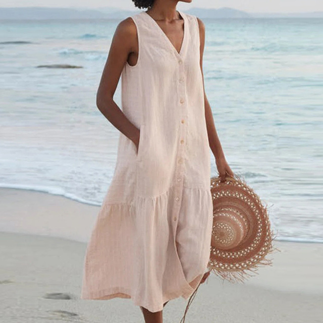Women's V-neck sleeveless midi dress with button front and ruffle hem. Perfect for summer casual or vacation.