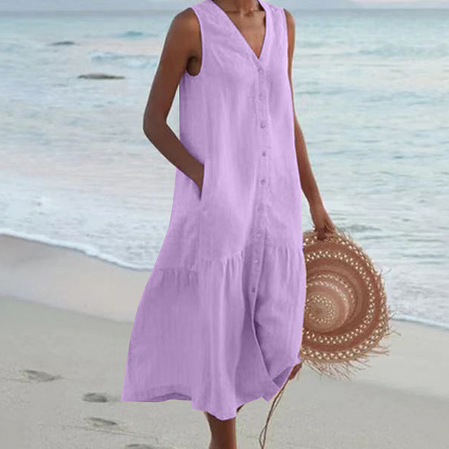 Full-length view of a women's button-front V-neck midi dress, perfect for vacation or warm weather activities.