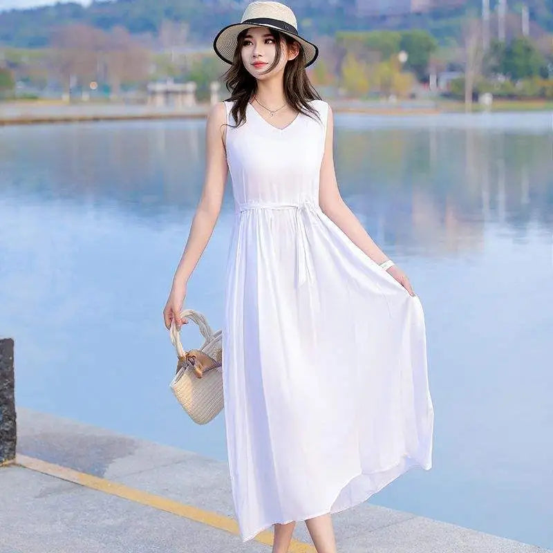 Chic women's V-neck sleeveless maxi dress with a defined tie waist, an elegant summer choice.