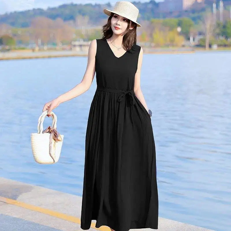Flowy V-neck sleeveless maxi dress for women, perfect for beach vacations & warm weather.