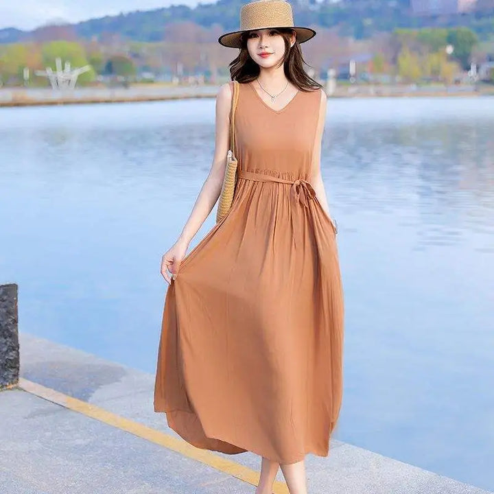 Elegant women's V-neck maxi dress with a flattering tie waist, great for day or evening.