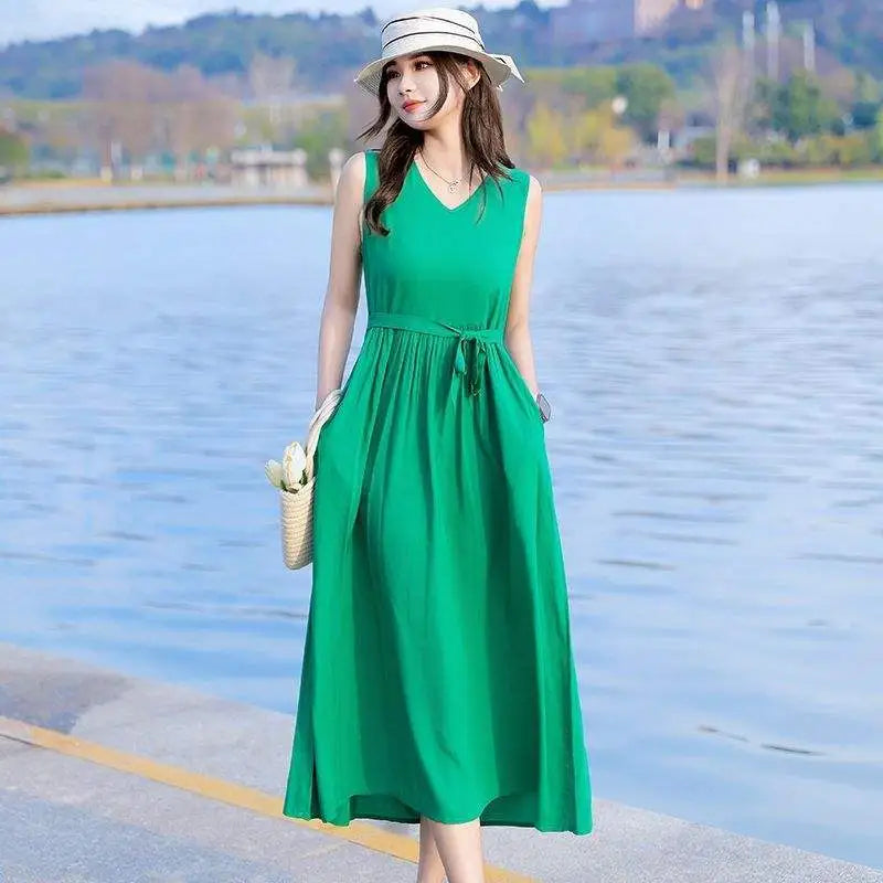 Plus size V-neck tie waist maxi dress, comfortable and flowy for women's summer fashion.