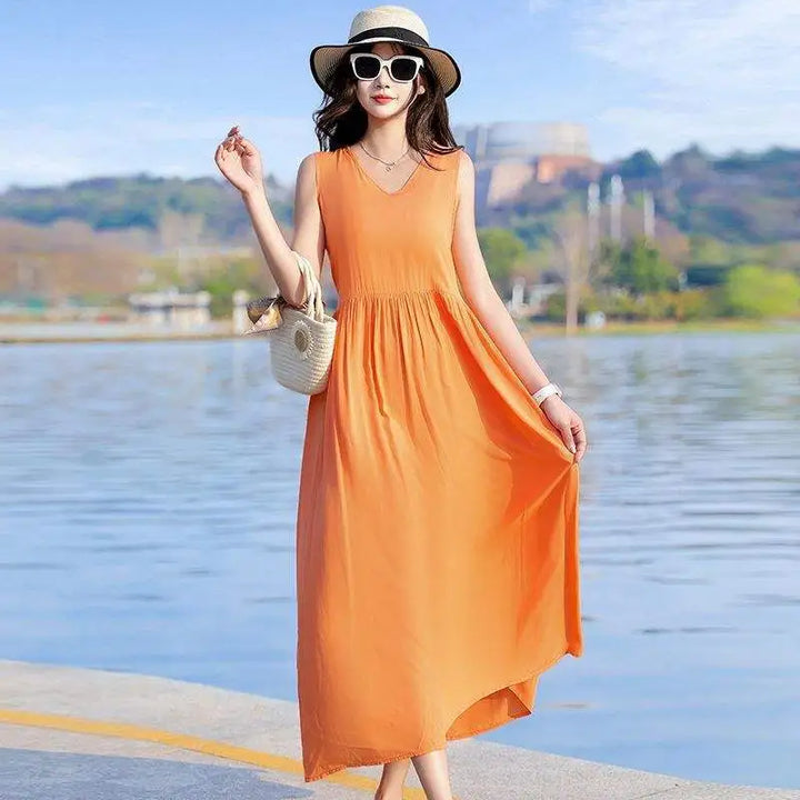 Women's elegant V-neck maxi dress with tie waist, suitable for evening wear or special occasions.