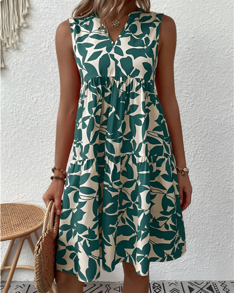 Women's V-neck tiered midi dress, perfect for relaxed summer days or elegant casual spring fashion.