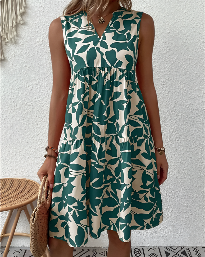 Women's V-neck tiered midi dress, perfect for relaxed summer days or elegant casual spring fashion.