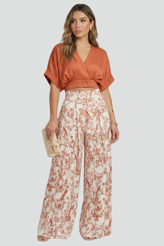 Comfortable women's two-piece V-neck top and wide leg trousers set, an elegant and casual summer outfit.