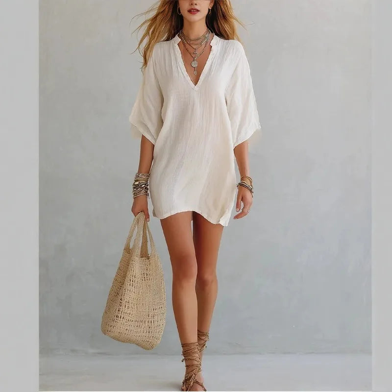 Relaxed fit V-neck mini tunic dress for women, versatile and comfortable casual wear, great for summer.