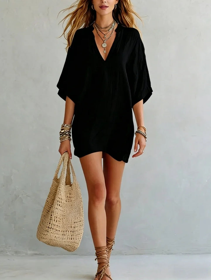 Effortless oversized V-neck tunic mini dress, comfortable women's summer dress for relaxed casual or beach style.