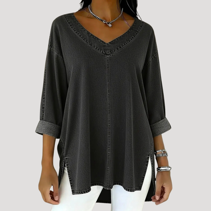 Comfortable women's longline V-neck tunic. Relaxed fit, elbow sleeves & stylish design for versatile wear.