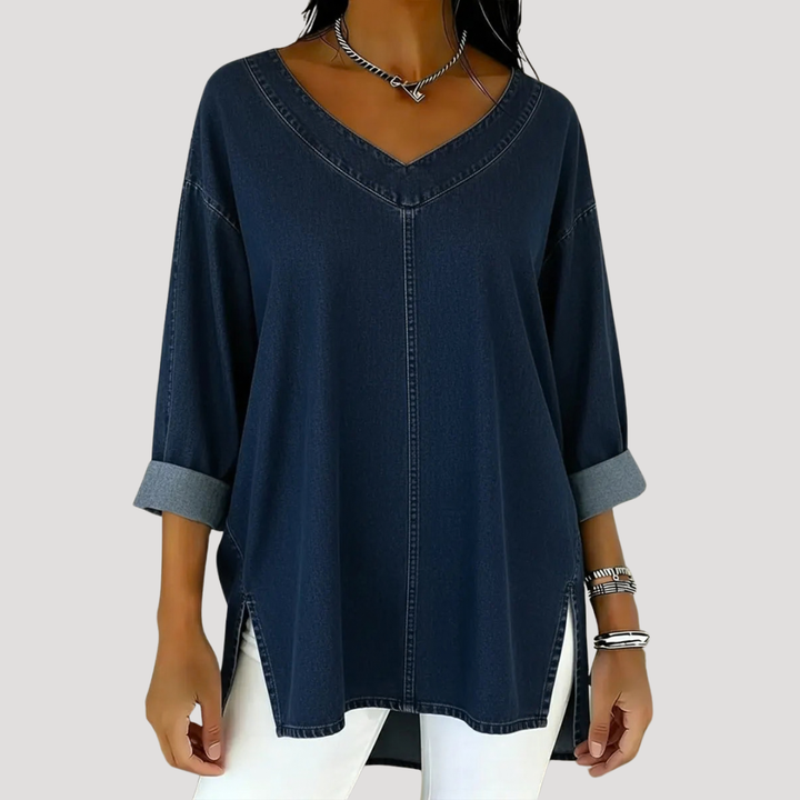 Effortless women's V-neck tunic top with relaxed fit, elbow sleeves & stylish side slits. Casual & comfortable.