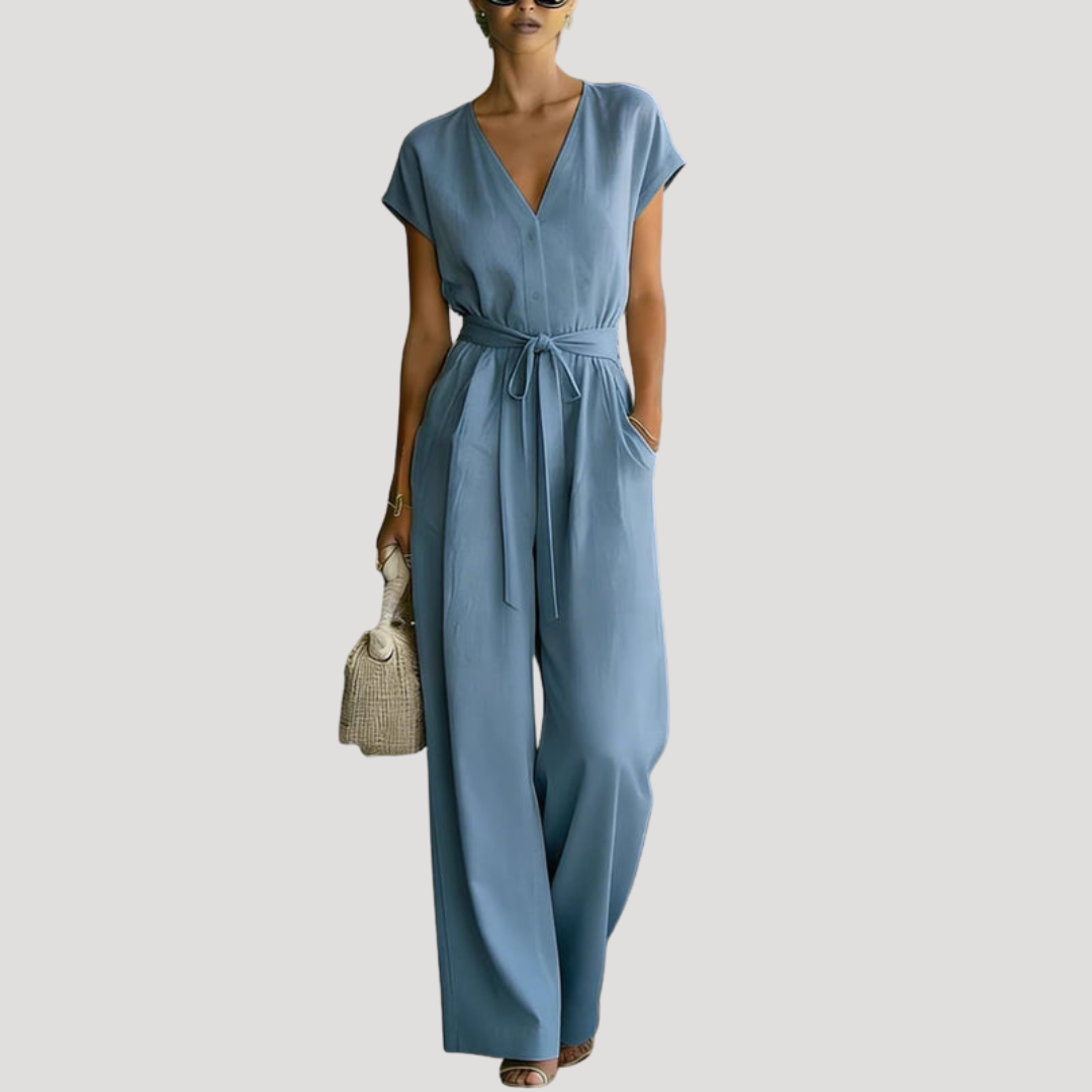 Stylish women's V-neck wide-leg jumpsuit. Tie waist design, perfect for casual or elegant summer looks.