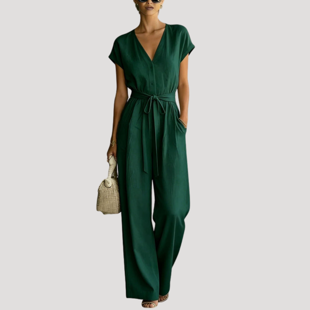 Comfortable women's wide-leg jumpsuit with a V-neck and tie waist, ideal for versatile summer styling.