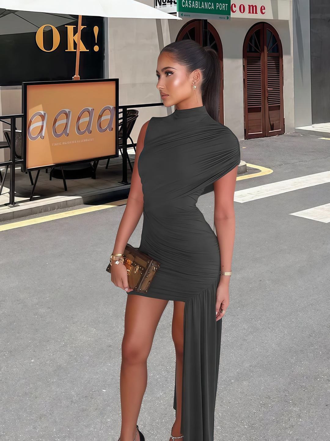 Fashionable women's Valeria draped mini dress. Elegant sleeveless design, ideal as a cocktail or evening party dress.