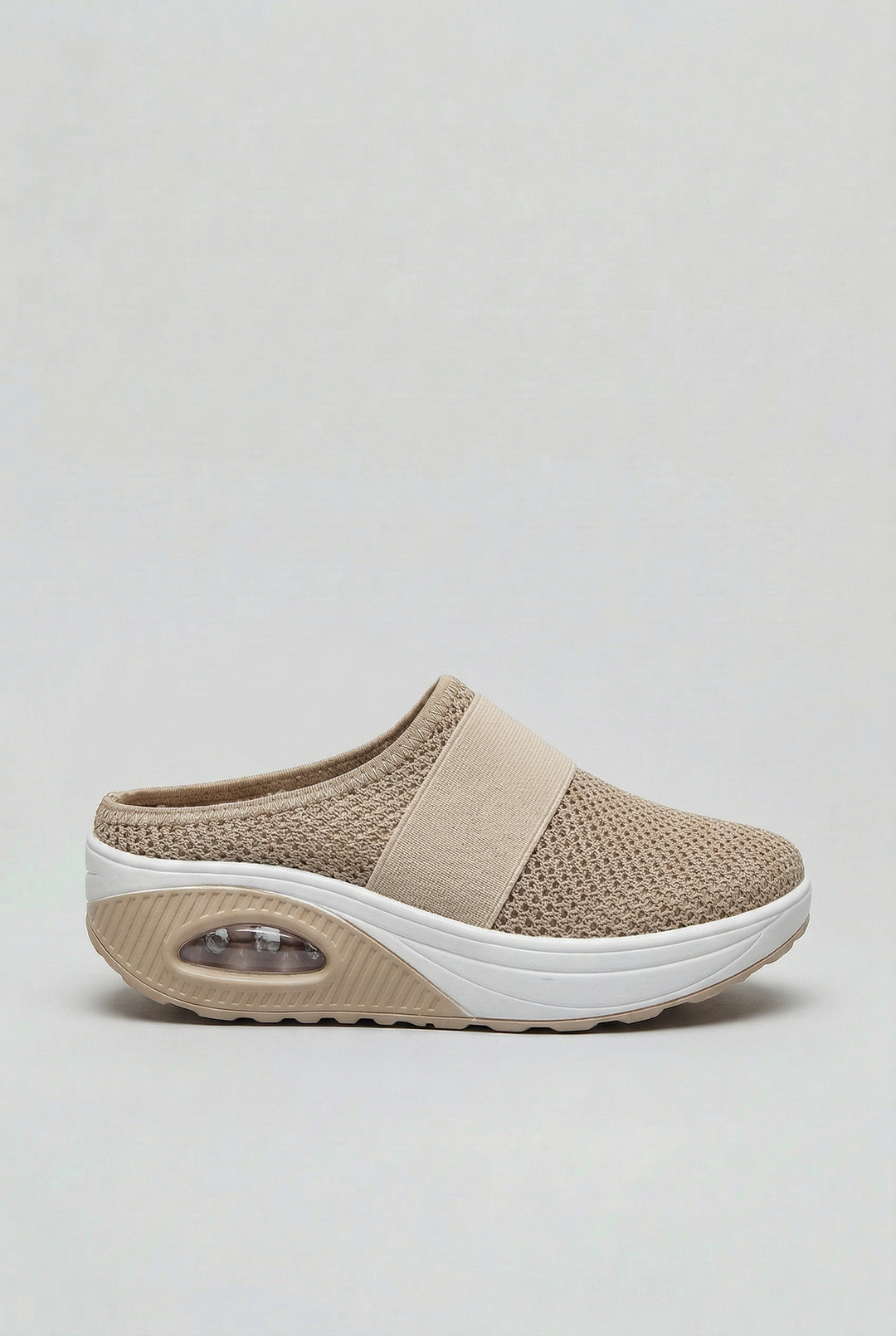 Women's ventilated slip-on mules with air cushion comfort for everyday casual wear.