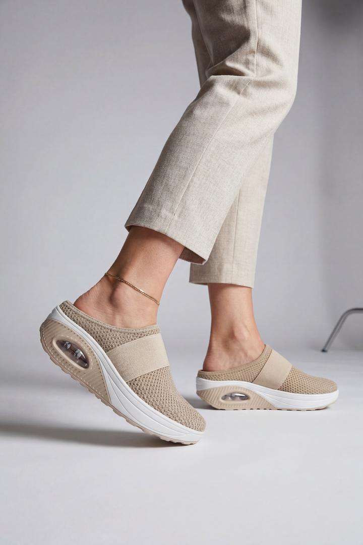 Breathable women's slip-on mules with air cushion for summer comfort, perfect for casual wear.