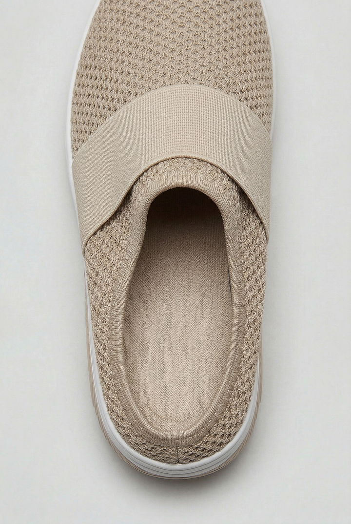 Easy slip-on open-back mules for women, featuring ventilated design and air cushion comfort.