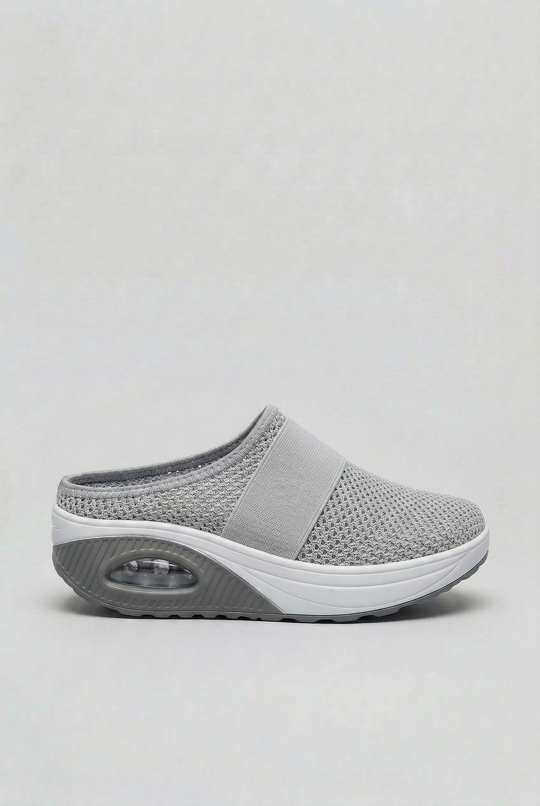 Air cushion women's mules, slip-on and ventilated for ultimate everyday comfort in casual settings.