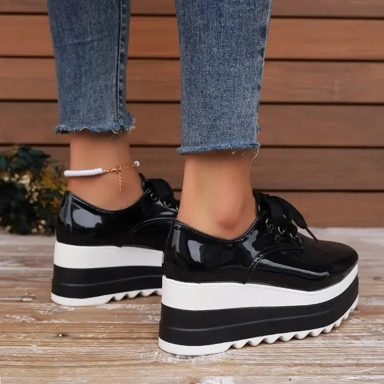 Unique glossy platform sneakers for women. Verona style, offering comfort and a stand-out casual look.