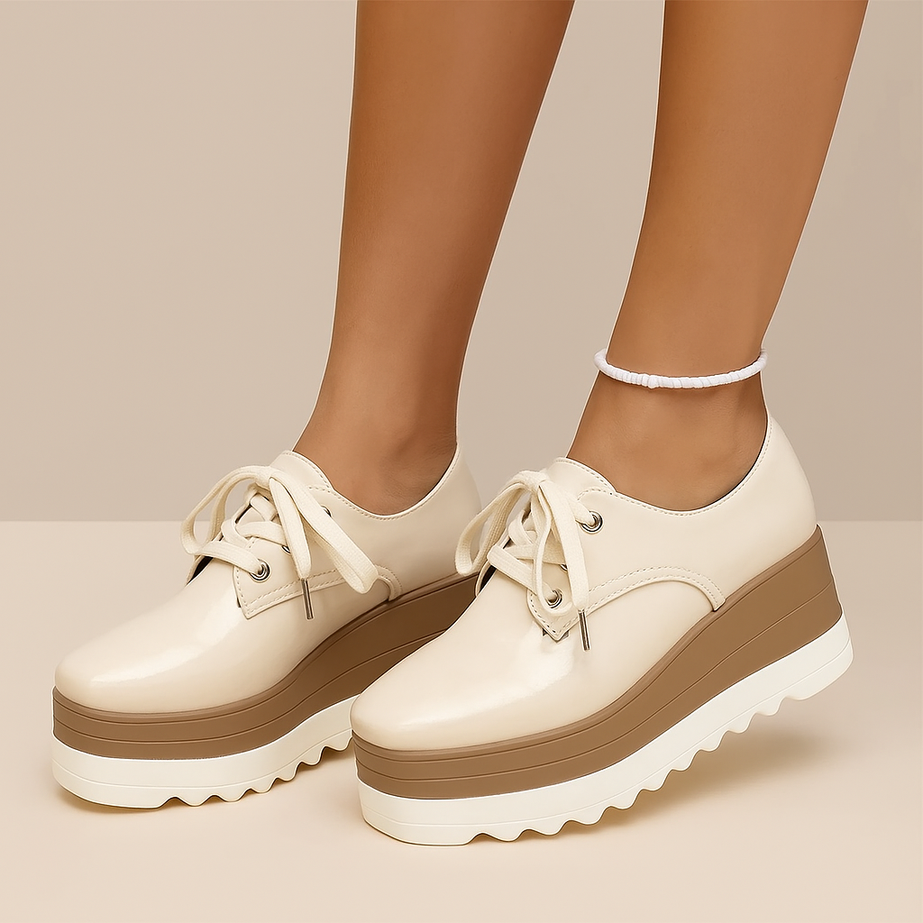 Trendy women's glossy platform sneakers. Verona design, perfect for fashion-forward casual footwear.