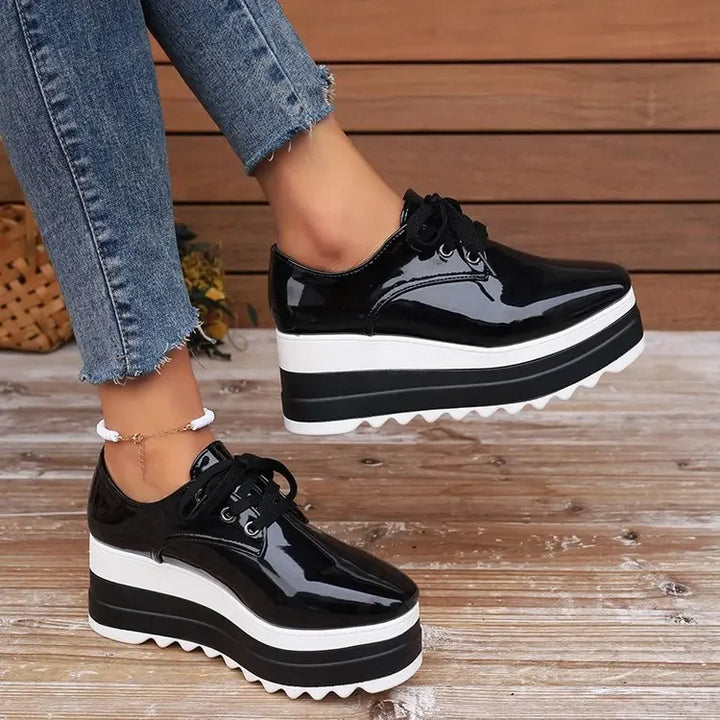 Elegant women's Verona Gloss platform sneakers. Shiny, comfortable, and chic for any casual outfit.