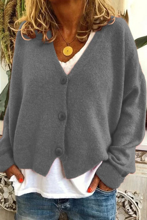 Classic women's button-up cardigan, offering effortless style and warmth.