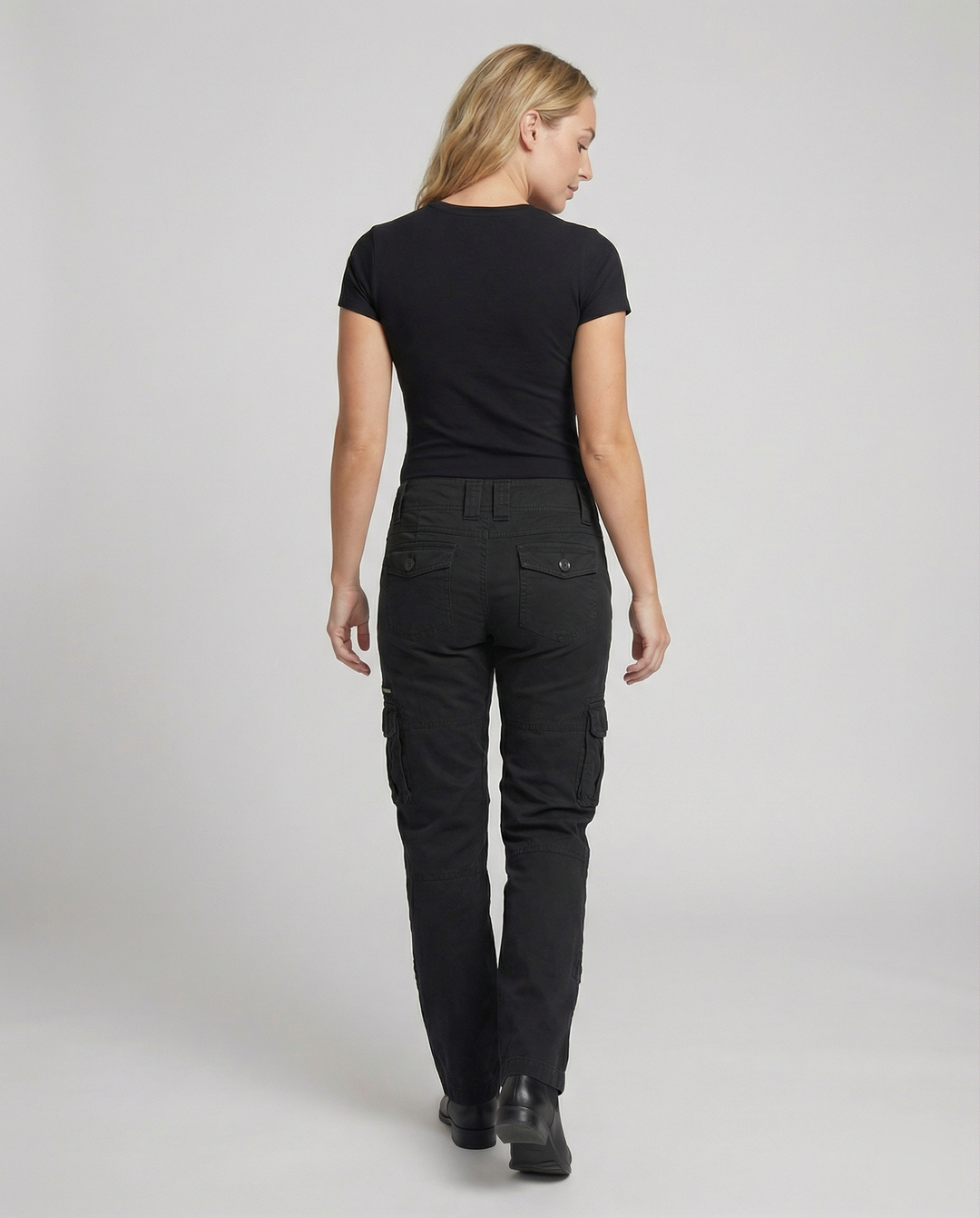 Stylish women's versatile cargo pants, great for travel, combining utility pockets with fashion.