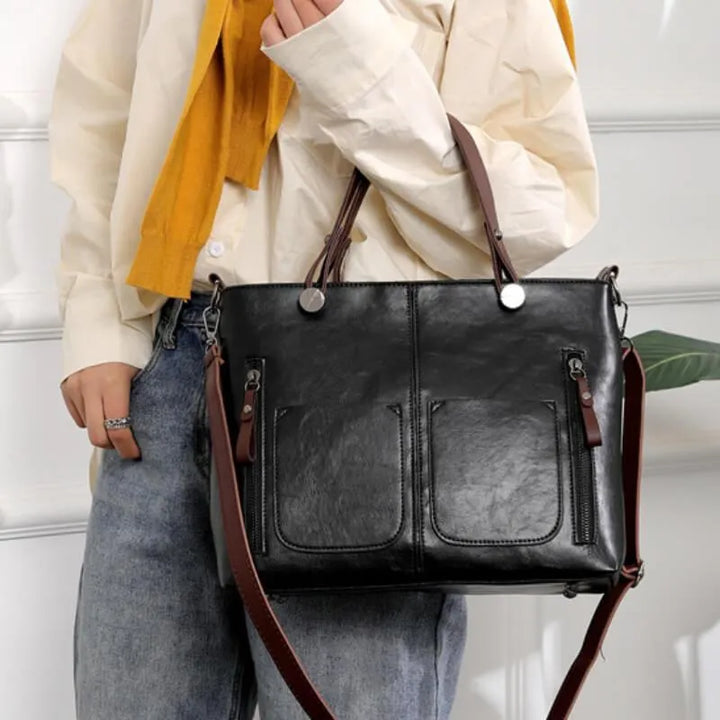 Stylish women's tote bag, durable & versatile, worn as shoulder or crossbody for everyday carry.