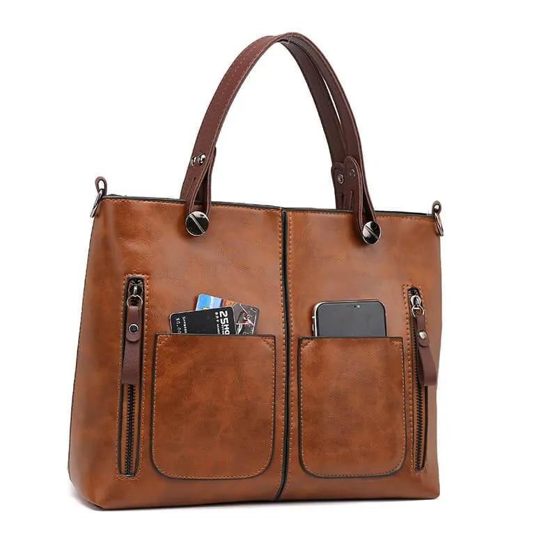 Fashionable women's versatile tote bag, durable & spacious, ideal for everyday carry and organization.