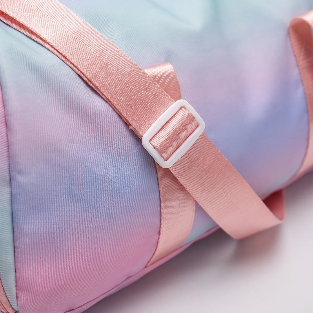 Spacious women's fitness duffel bag. Ideal for gym, sports, and weekend travel with a convenient shoe compartment.