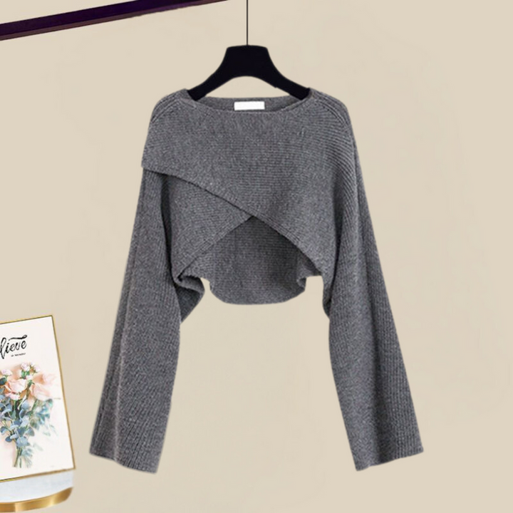 Stylish women's layered knit dress set; a casual yet elegant outfit with a comfy knit A-line dress and sweater.