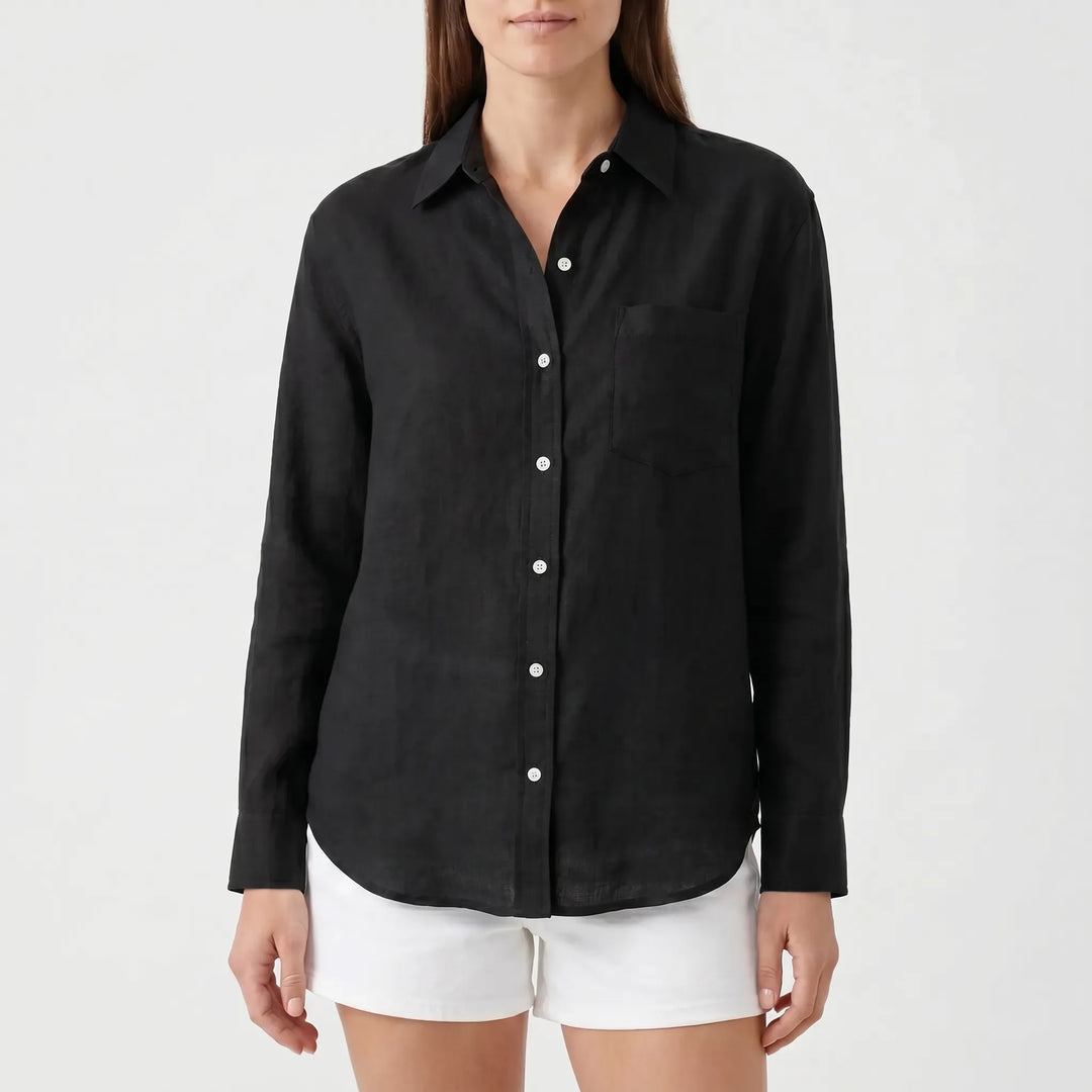 Professional women's long-sleeved button-up work blouse, offering comfortable and smart office attire.