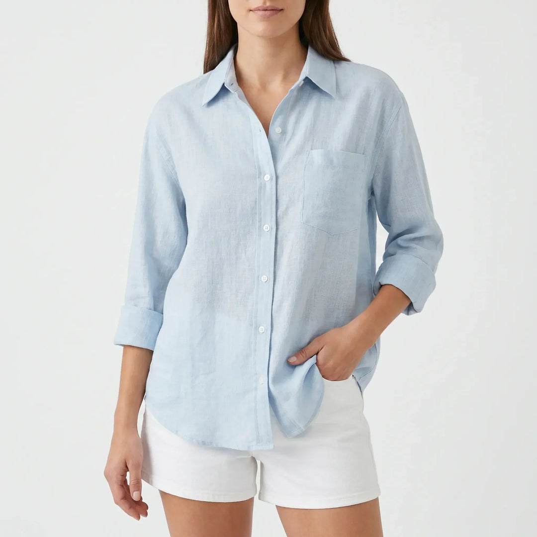 Comfortable women's button-up long-sleeve shirt, perfect for everyday style & office attire.