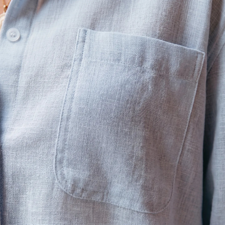 Elegant women's long-sleeve button-up blouse, ideal for office, casual outings & all-season wear.