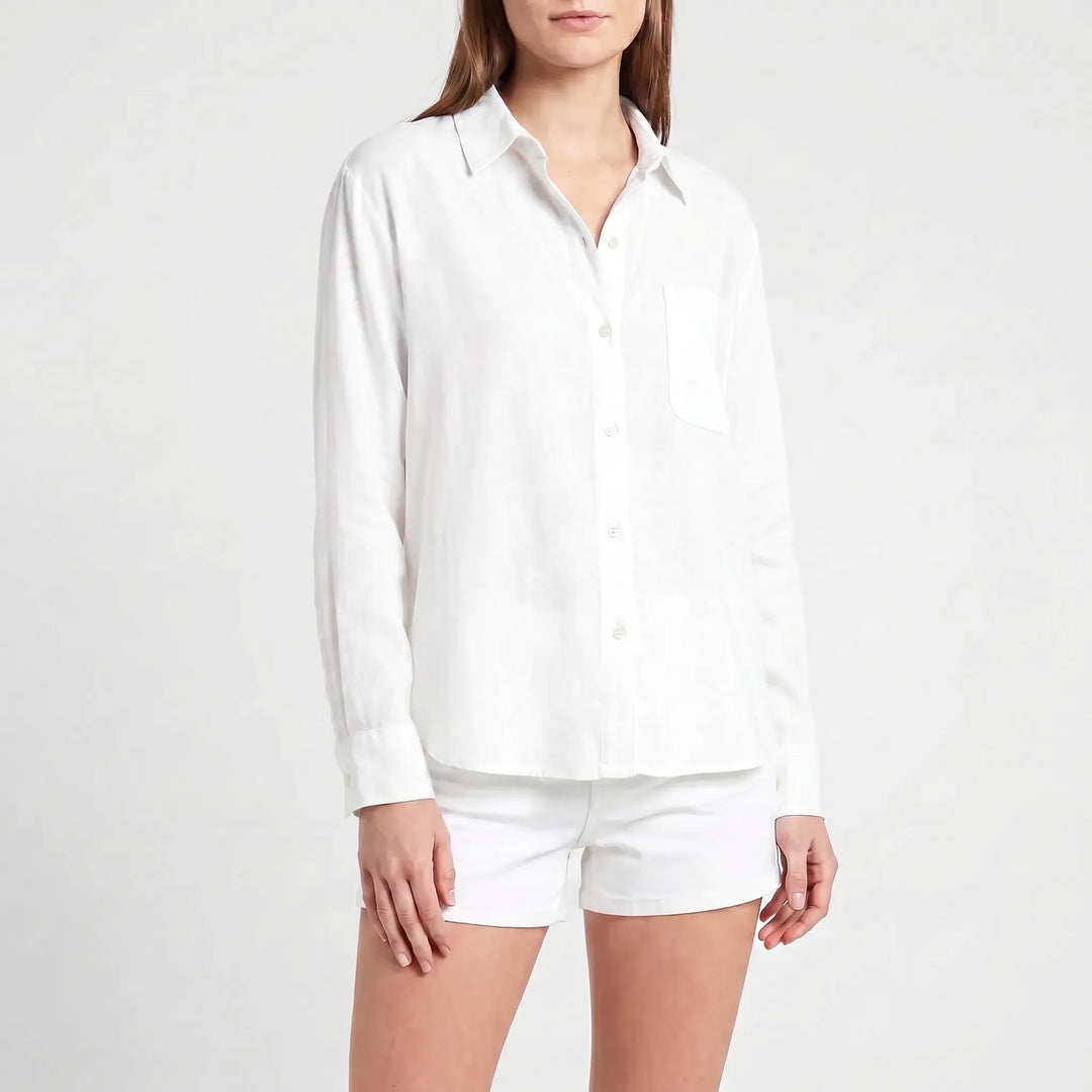 Comfortable long-sleeve women's button-up shirt, versatile for all-season everyday & work wear.