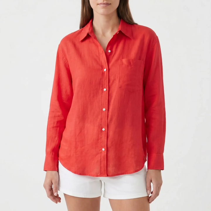 Stylish women's long-sleeved button-up blouse, great for office, casual, & versatile styling.