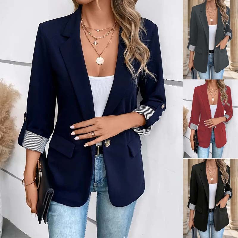 Women's versatile notch lapel blazer with roll sleeves and striped cuffs. Smart casual office wear.