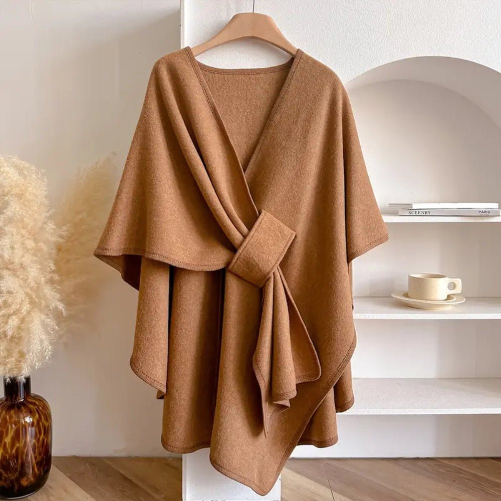 Elegant women's fashion accessory: a versatile poncho scarf coat for stylish all-season layering.