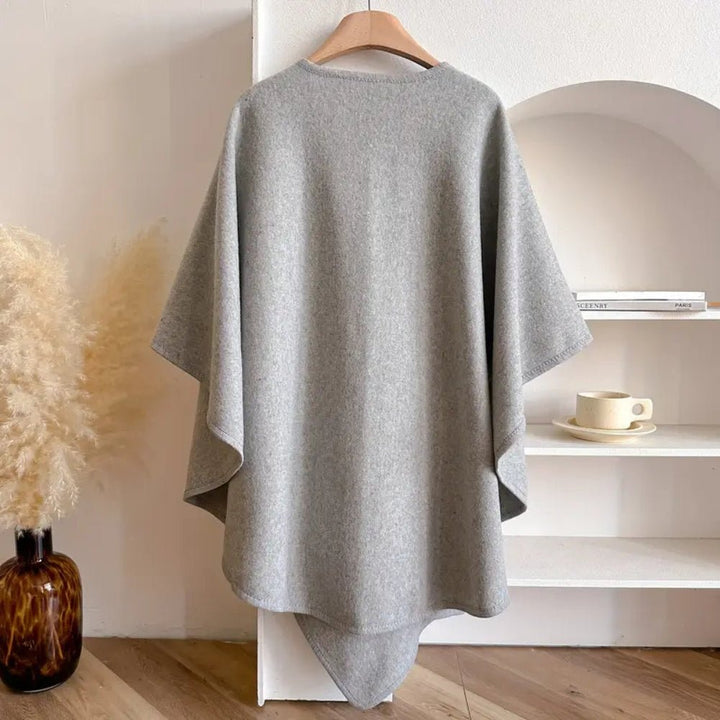 Comfortable women's versatile poncho scarf coat, stylish all-season layering for elegant outerwear.