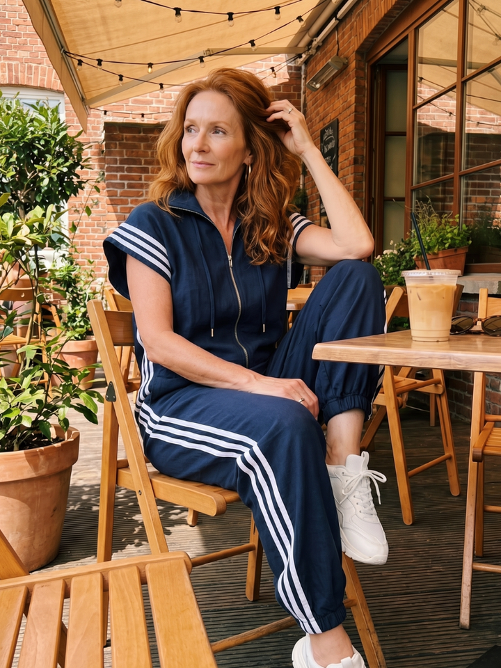 Modern work wear striped zip front jumpsuit for women, a comfortable and stylish option.