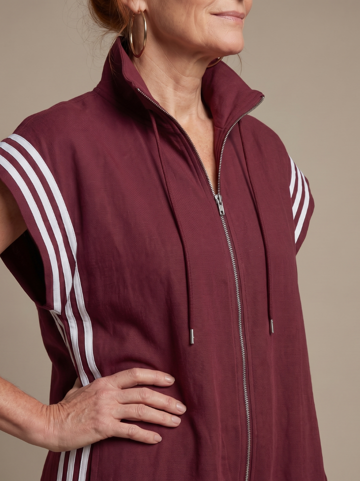 Modern striped zip front one-piece jumpsuit for women, offering versatile everyday style.
