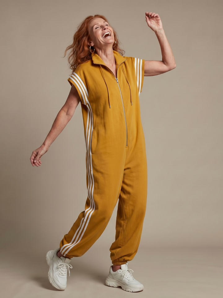 Striped zip front jumpsuit for women, featuring a comfortable relaxed fit and cap sleeves.