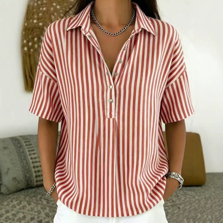 Stylish women's vertical stripe top, relaxed fit, half-button design. A must-have for casual chic outfits.