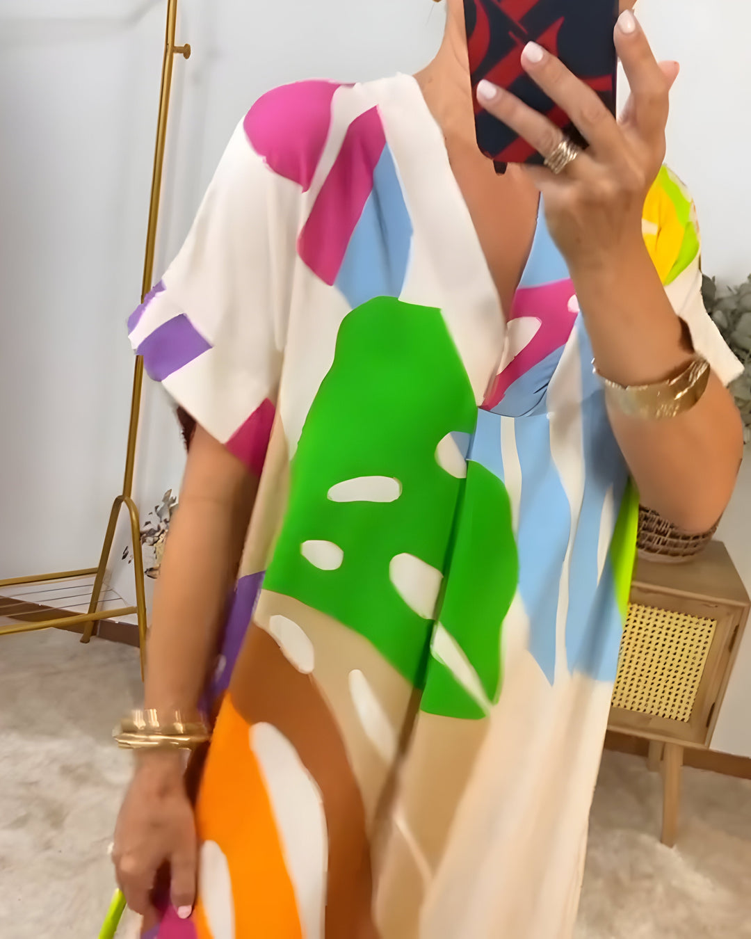 Vibrant abstract print V-neck shift dress for women, comfortable short sleeve casual summer wear.